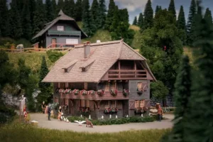 Faller 130012 1/87 JUBILÄUMSMODELL UHRENMACHERHAUS MIT FIGUR